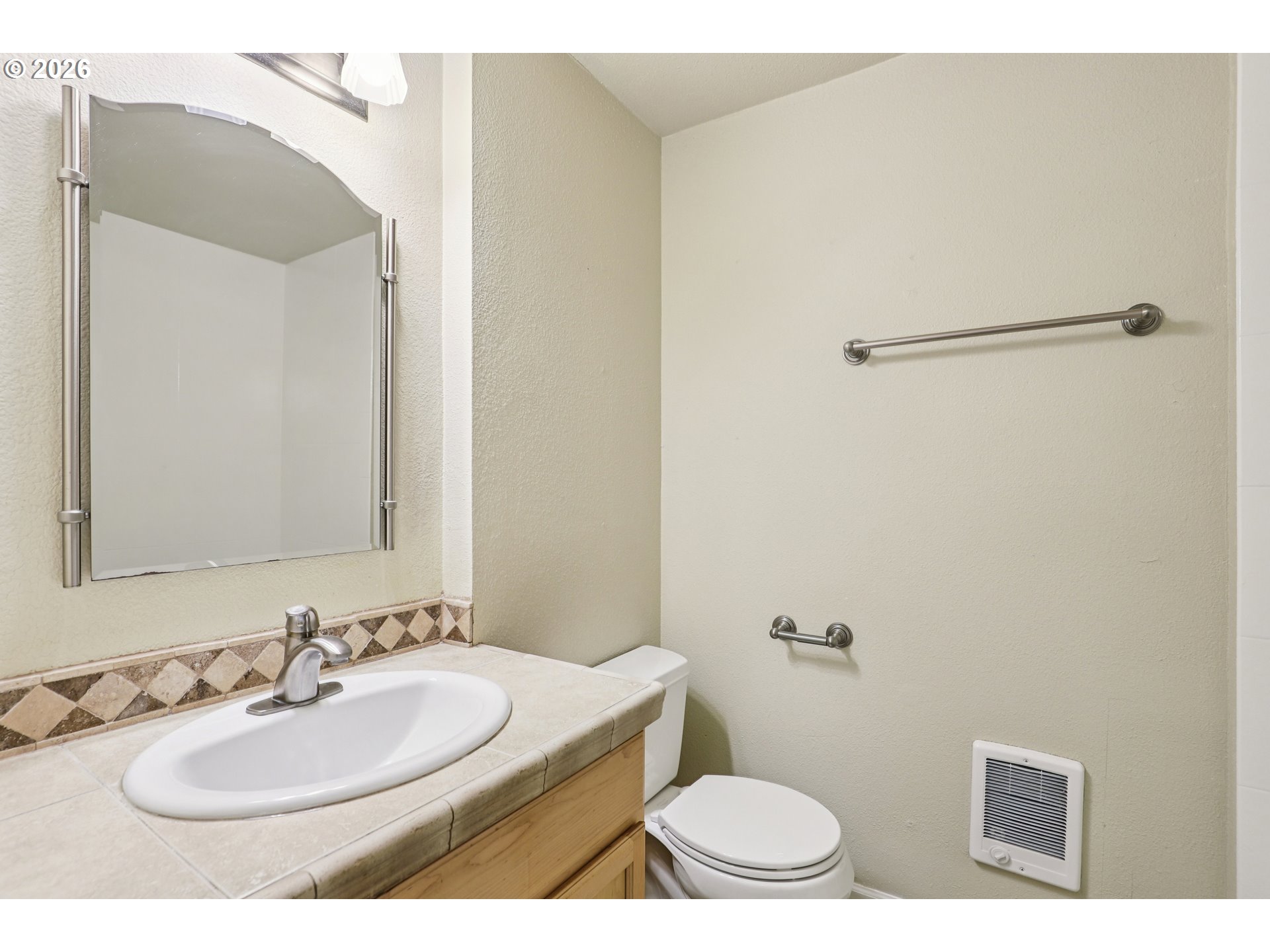 2680 Southwest 87th Avenue, Unit 5 Portland, OR 97225 - Photo 13 of 25 a bathroom with a sink and a mirror