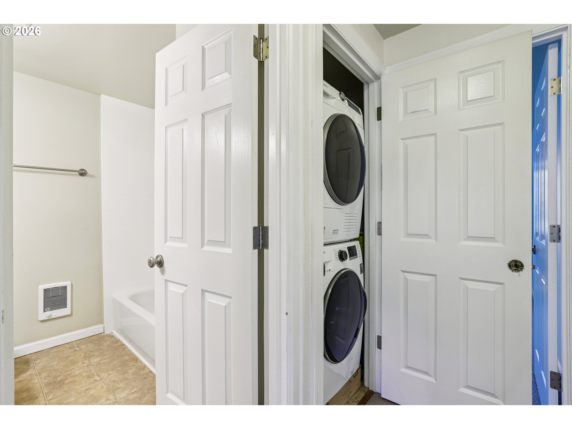 2680 Southwest 87th Avenue, Unit 5 Portland, OR 97225 - Photo 20 of 25 a view of a hallway with washer and dryer