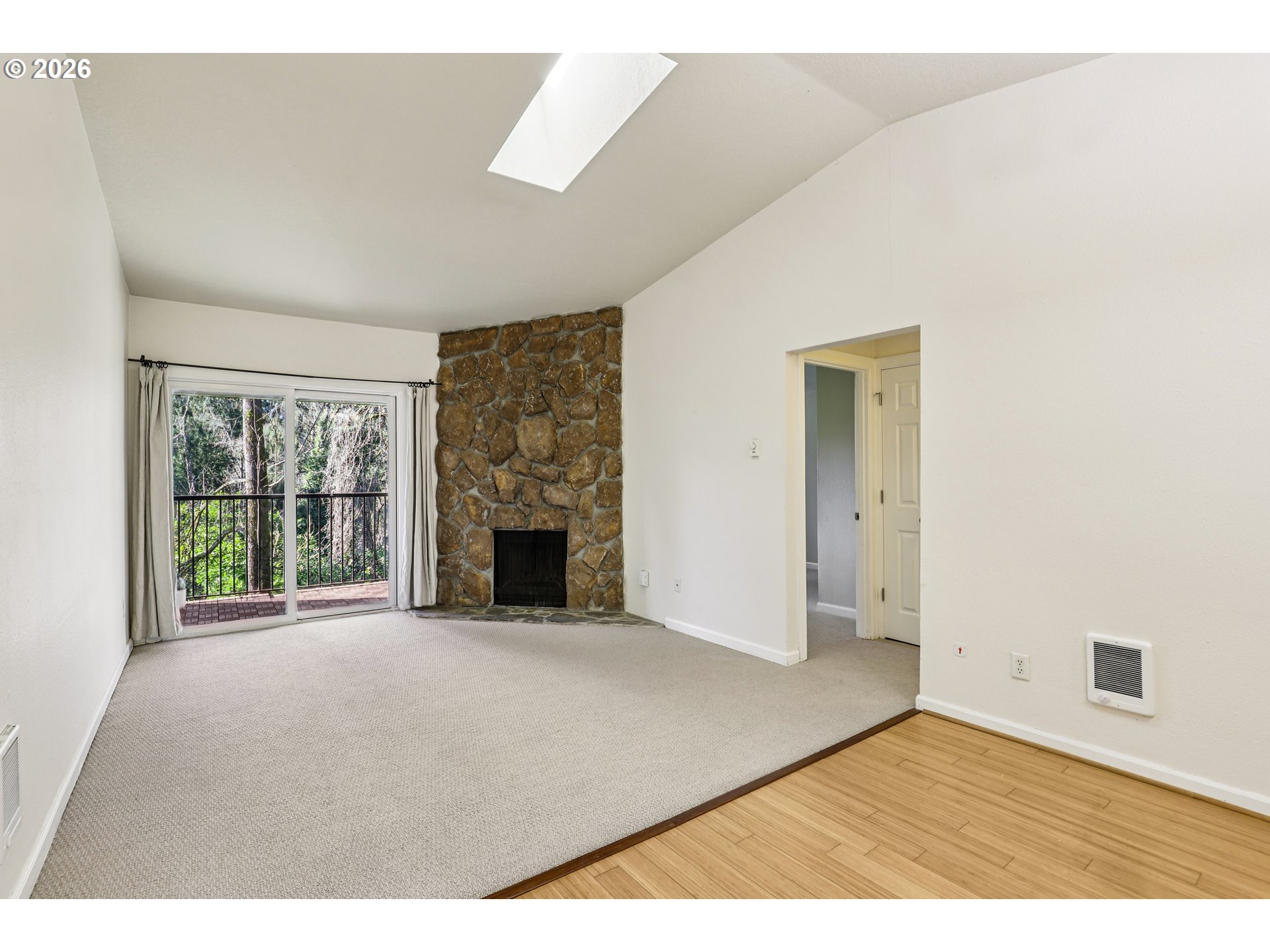 2680 Southwest 87th Avenue, Unit 5 Portland, OR 97225 - Photo 2 of 25 a view of an empty room with a window