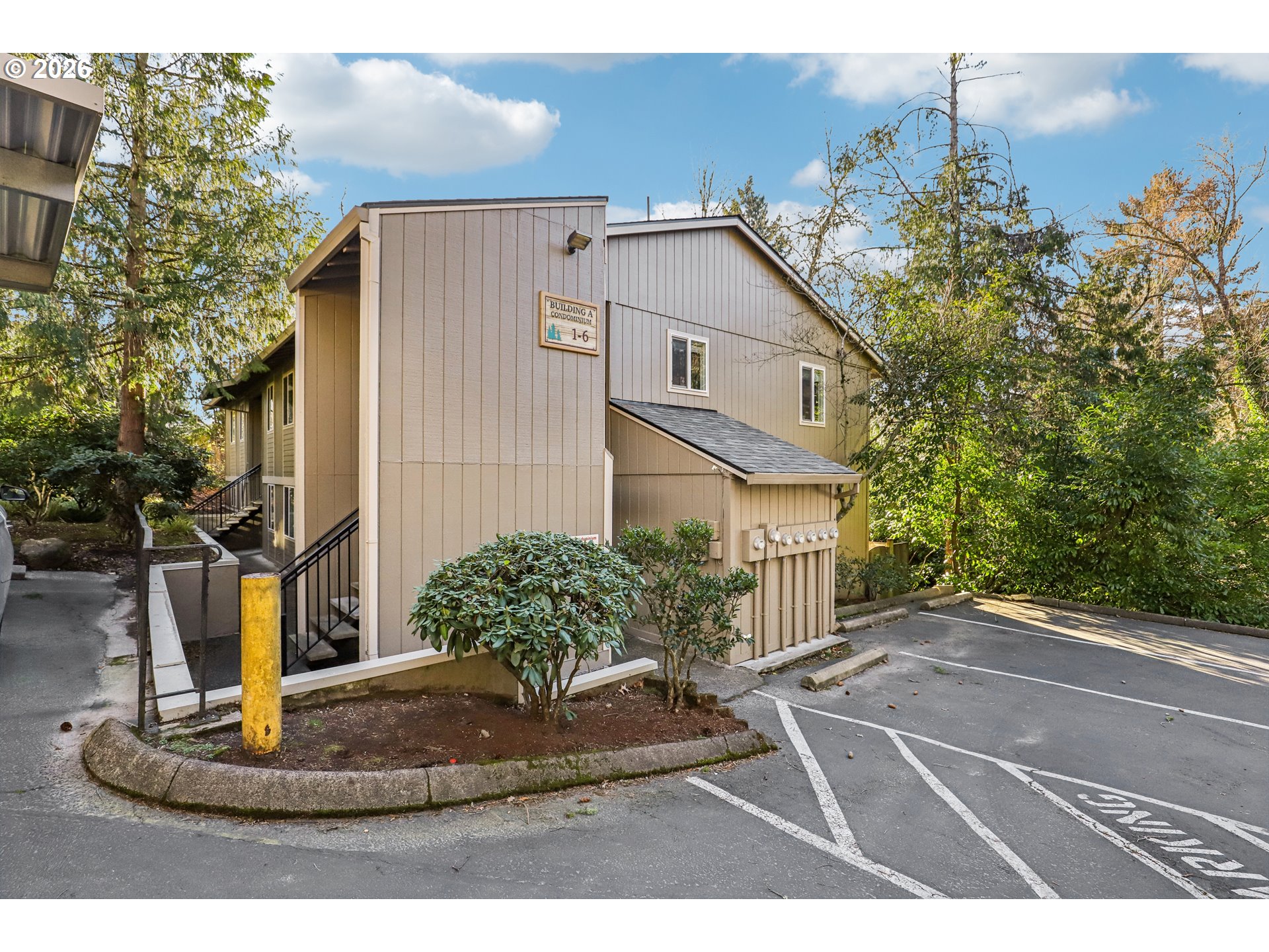 2680 Southwest 87th Avenue, Unit 5 Portland, OR 97225 - Photo 23 of 25 a view of a house with a yard
