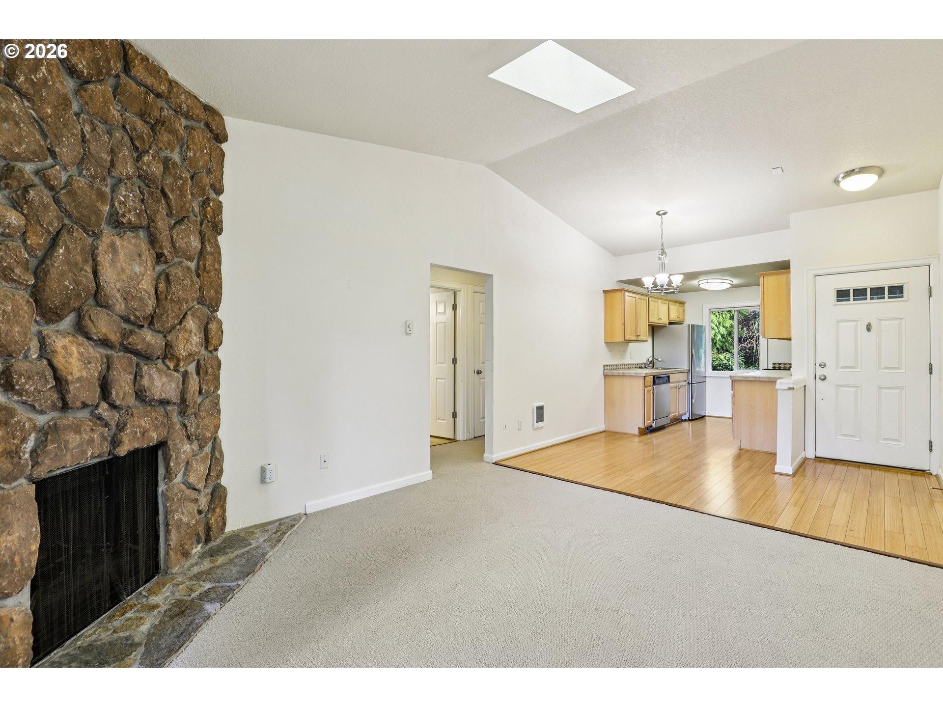 2680 Southwest 87th Avenue, Unit 5 Portland, OR 97225 - Photo 4 of 25 a view interior of a house wooden floor and a fire place