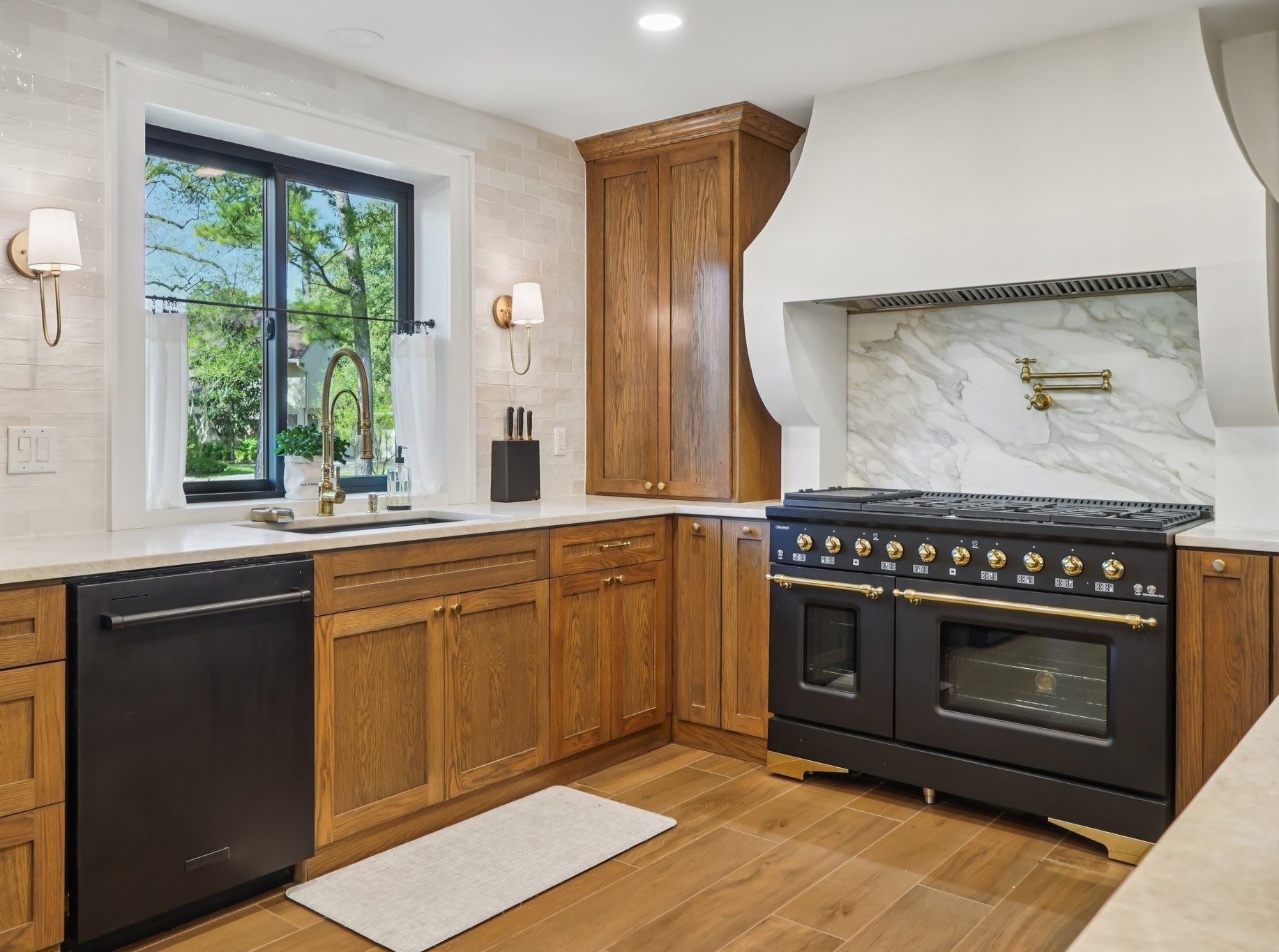 Fully renovated designer kitchen with premium appliances and elevated finishes throughout