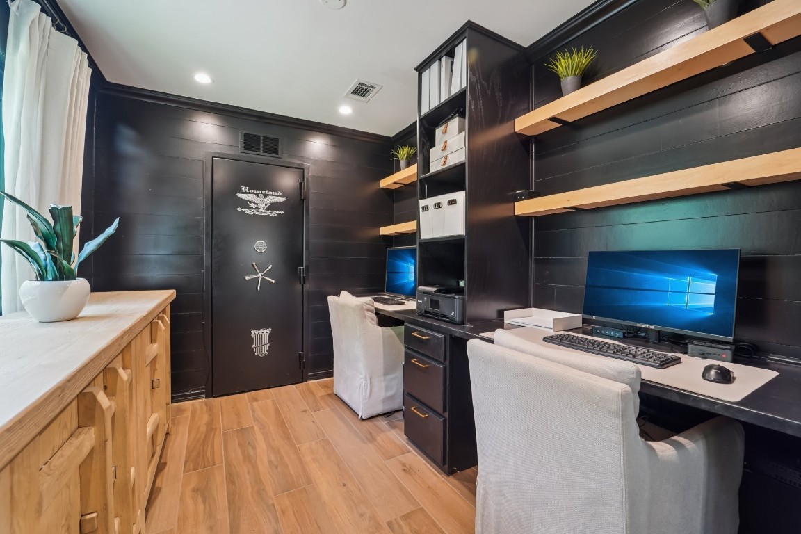 8307 Ash Valley Drive Spring, TX 77379 - Photo 14 of 48 Off the living room is new office with custom built ins and secure vault room