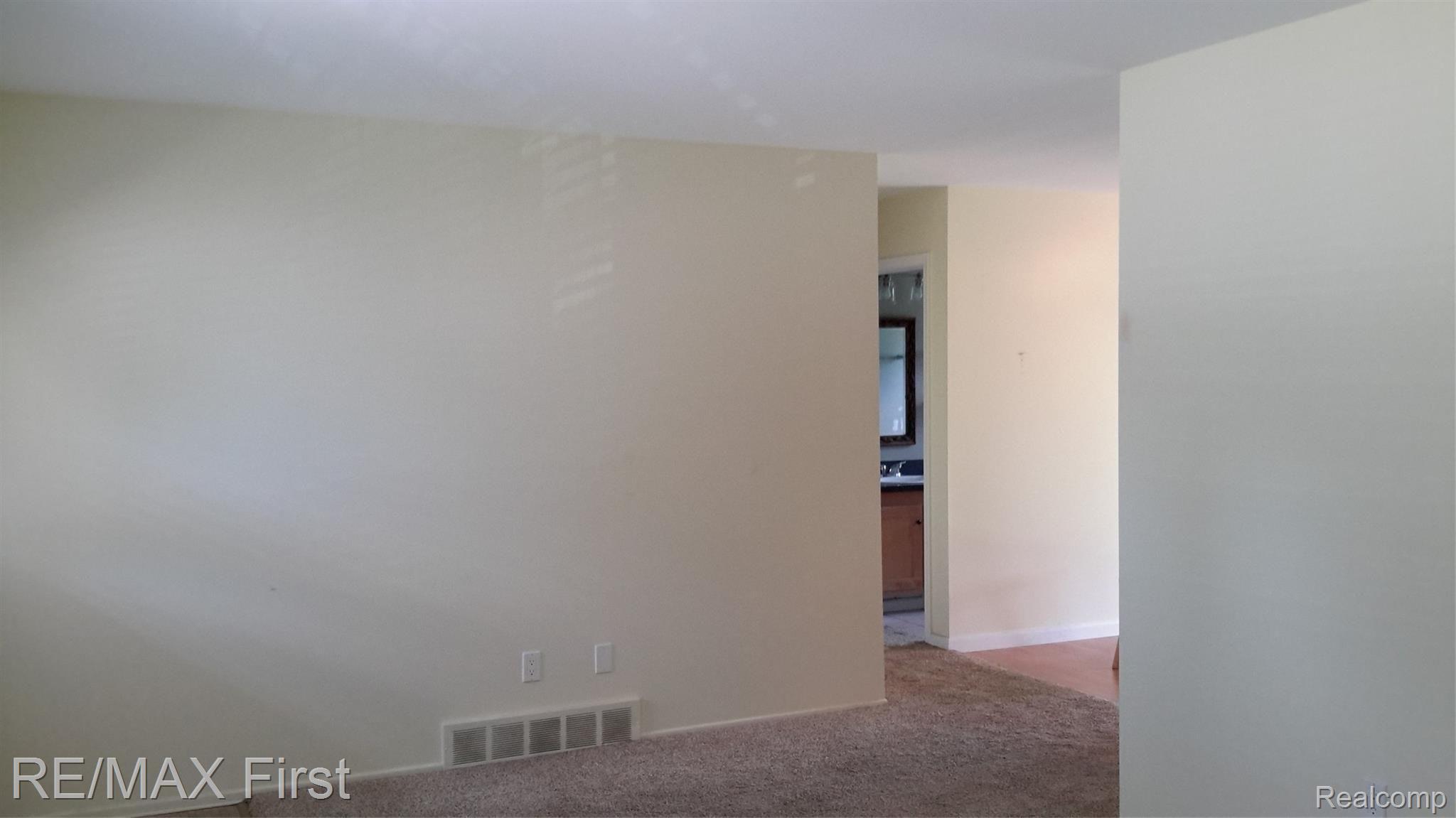 LIVING ROOM TO HALLWAY - DINING ROOM