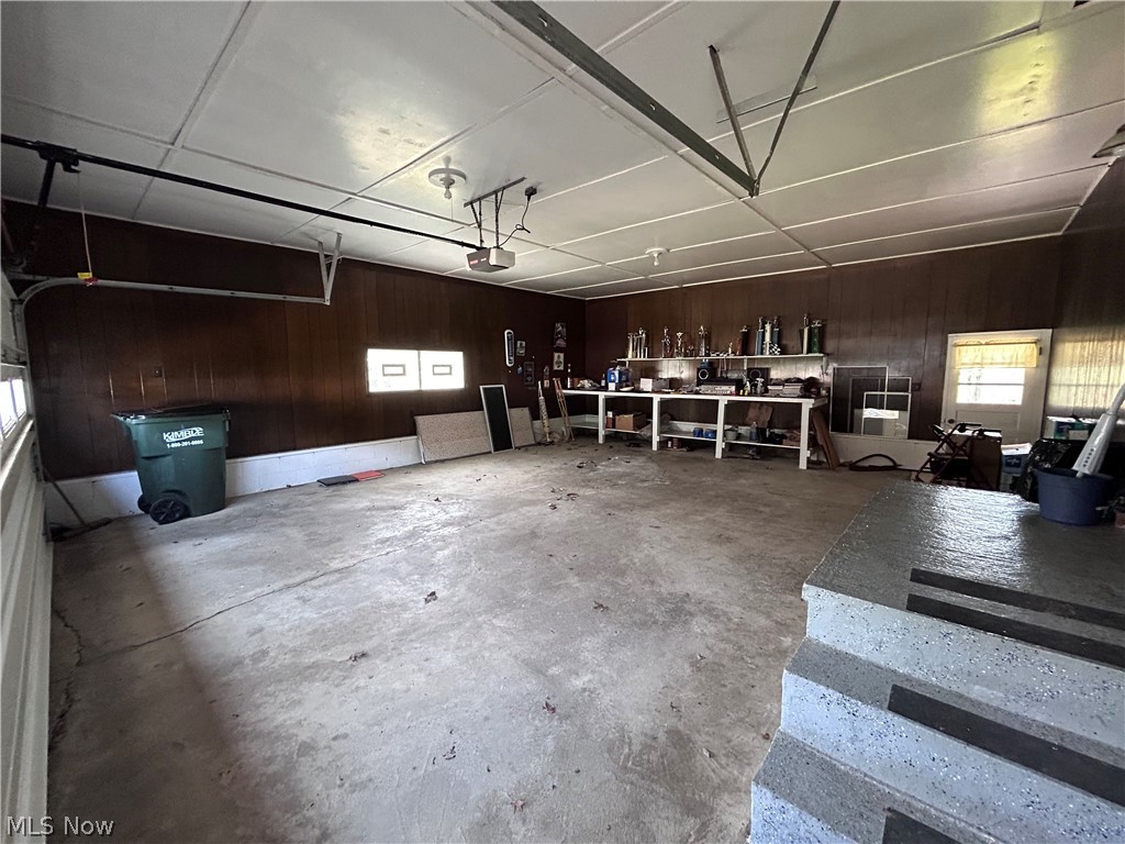 8300 Bear Road Southeast Amsterdam, OH 43903 - Photo 11 of 38 2 Car Attached Garage with Entrance to Backyard and House