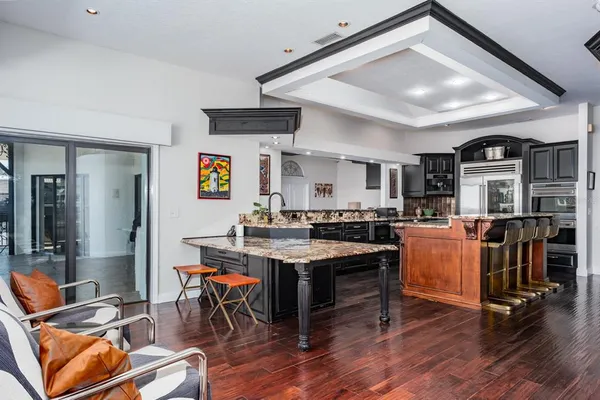 a room with furniture and wooden floor