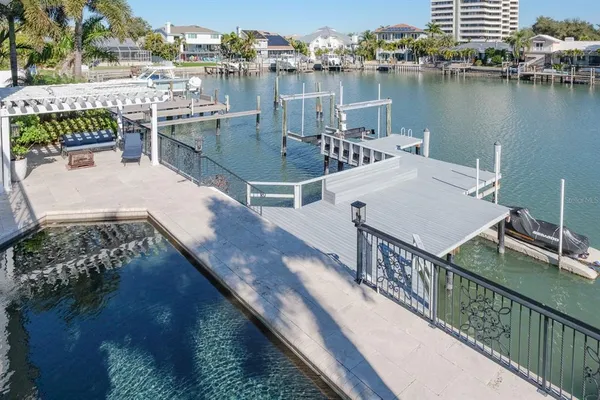 a view of a balcony with chairs