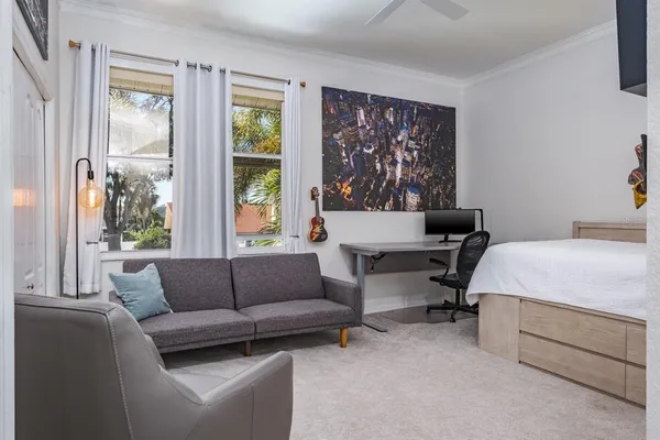 a living room with furniture and a window