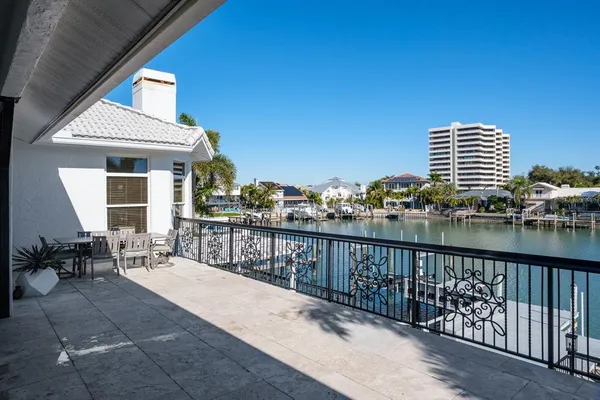 a balcony with outdoor seating