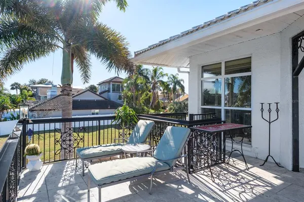 a view of balcony with a patio