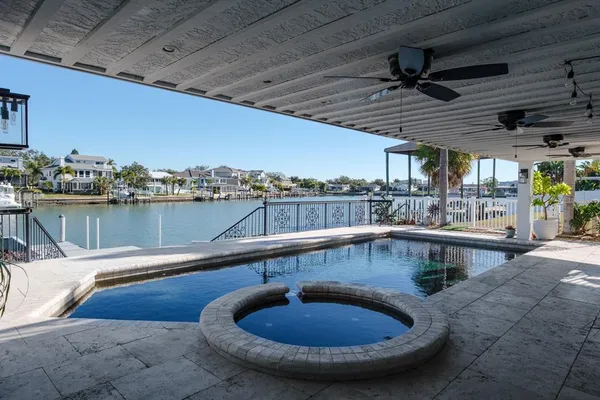 a outdoor space with swimming pool and furniture