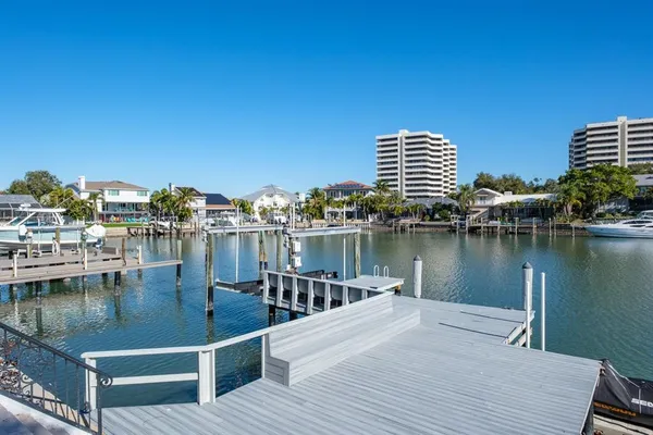 a view of a lake with tall buildings