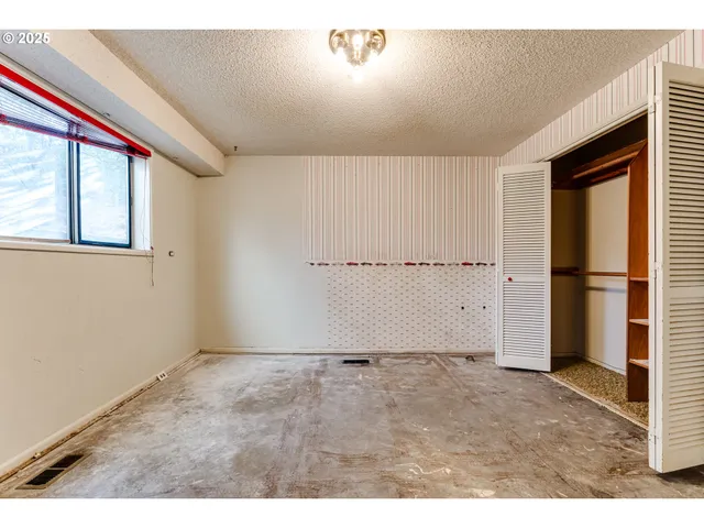 a bathroom with a sink a mirror and a shower