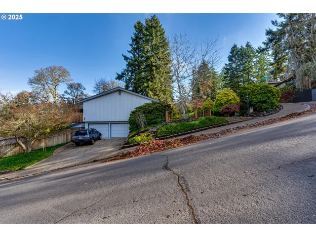 a view of a house with a street