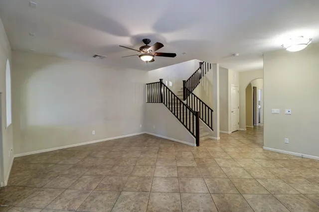 a view of a hallway with staircase