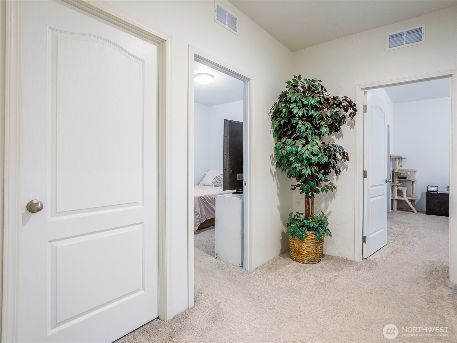 9430 Case Road Southwest, Unit 29 Olympia, WA 98512 - Photo 15 of 22 an empty room with a potted plant and a window