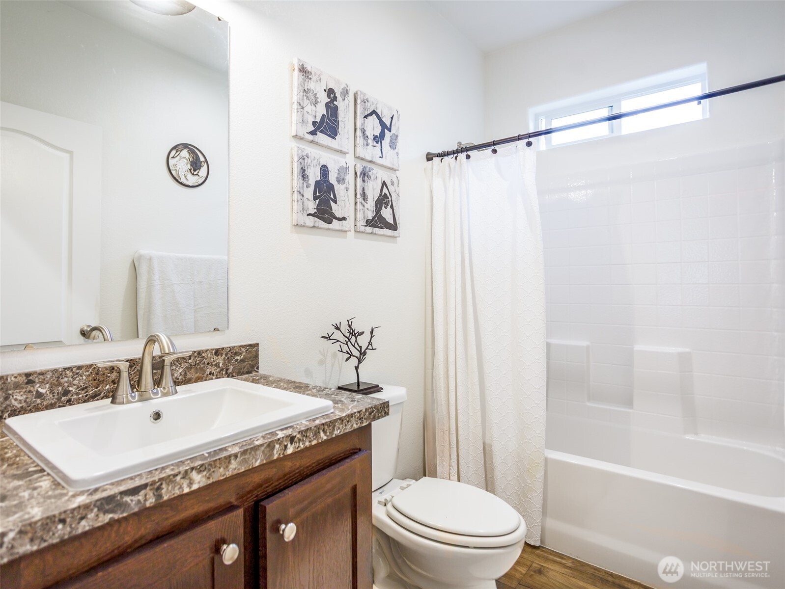 9430 Case Road Southwest, Unit 29 Olympia, WA 98512 - Photo 16 of 22 a bathroom with a granite countertop sink toilet and shower