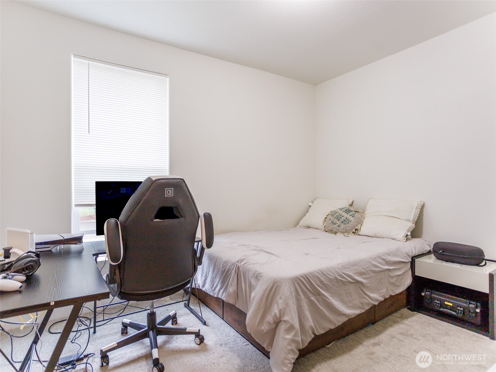 9430 Case Road Southwest, Unit 29 Olympia, WA 98512 - Photo 17 of 22 a bedroom with a bed and a desk
