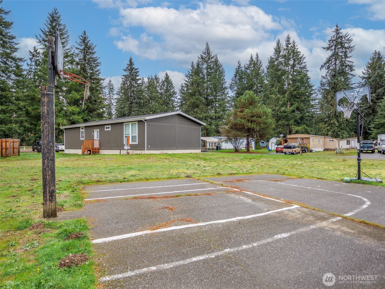 9430 Case Road Southwest, Unit 29 Olympia, WA 98512 - Photo 4 of 22 a view of a house with a street