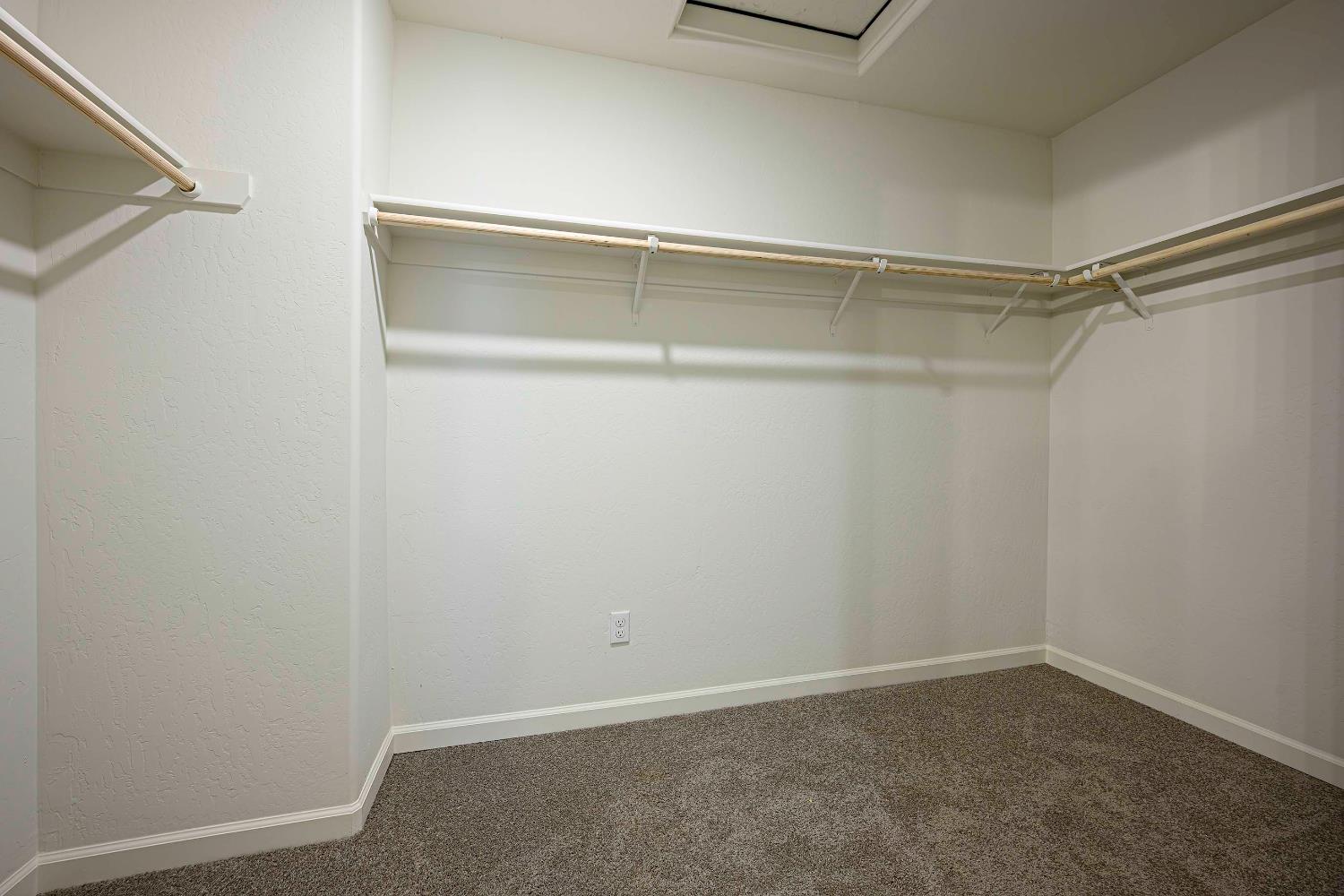 63 Blueberry Lane, Unit 5 Merced, CA 95341 - Photo 14 of 28 a view of an empty walk in closet