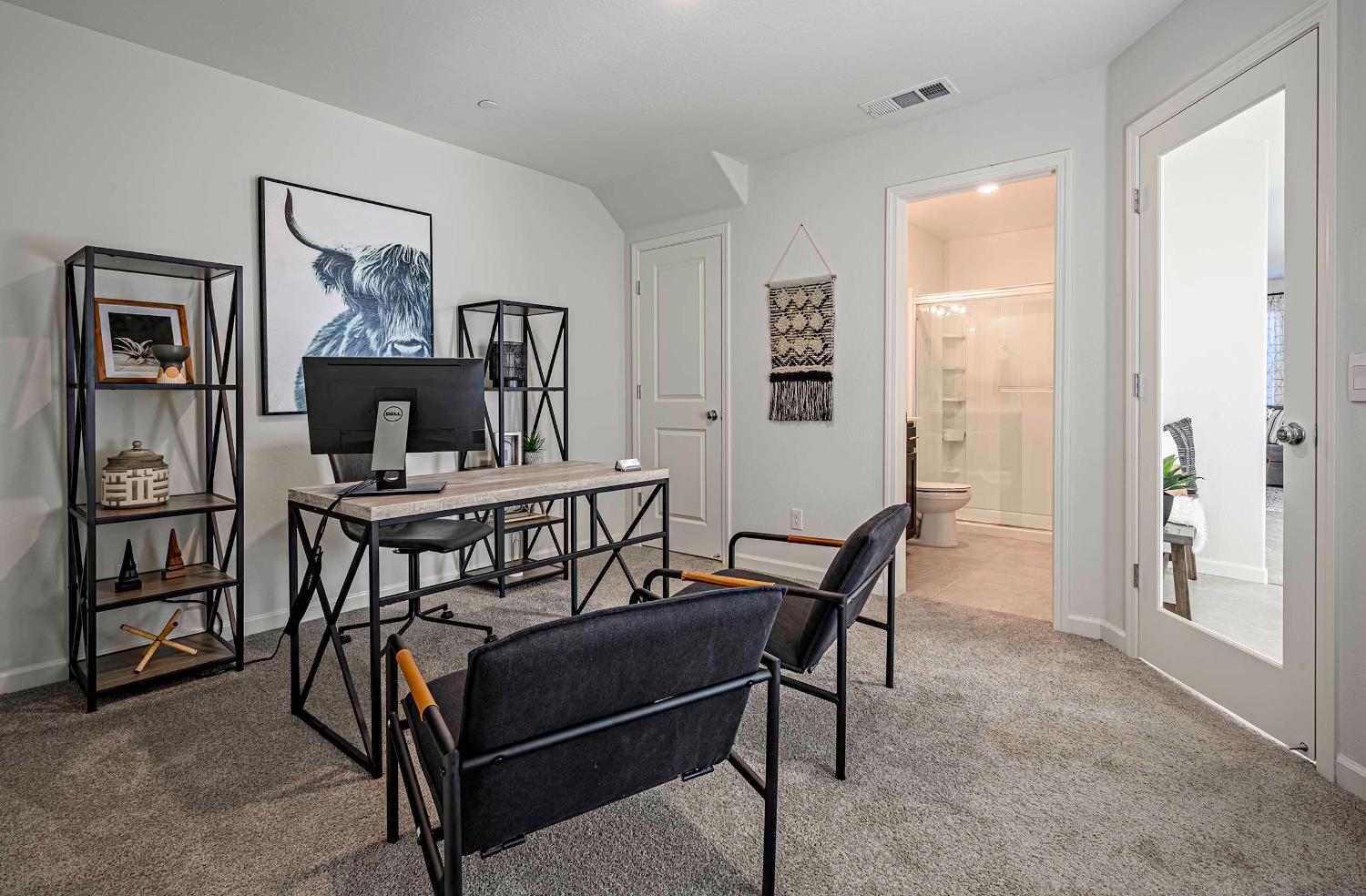 63 Blueberry Lane, Unit 5 Merced, CA 95341 - Photo 10 of 28 a view of a livingroom with furniture and a wooden floor