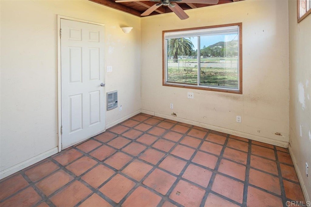 2061 Sycamore Drive San Marcos, CA 92069 - Photo 12 of 27 an empty room with windows