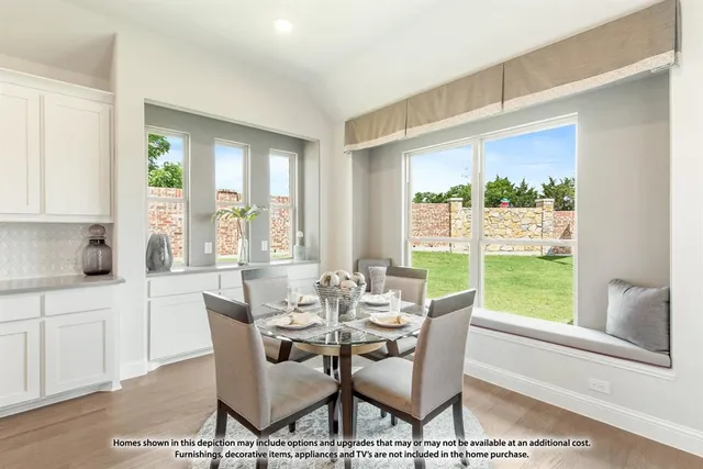 a bedroom with a bed and glass window