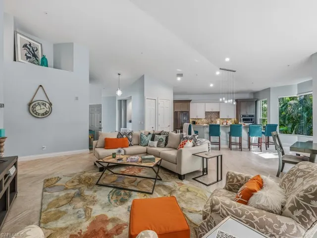 a living room with furniture and a table
