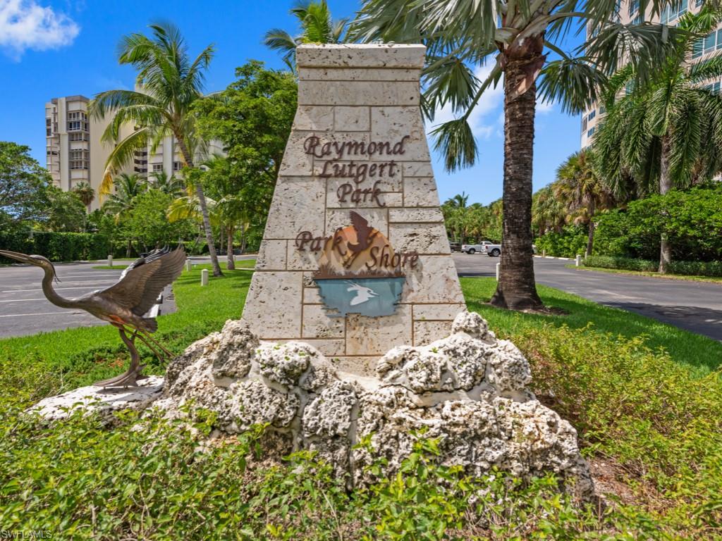 175 Colonade Circle Naples, FL 34103 - Photo 38 of 45 a building view with a garden space