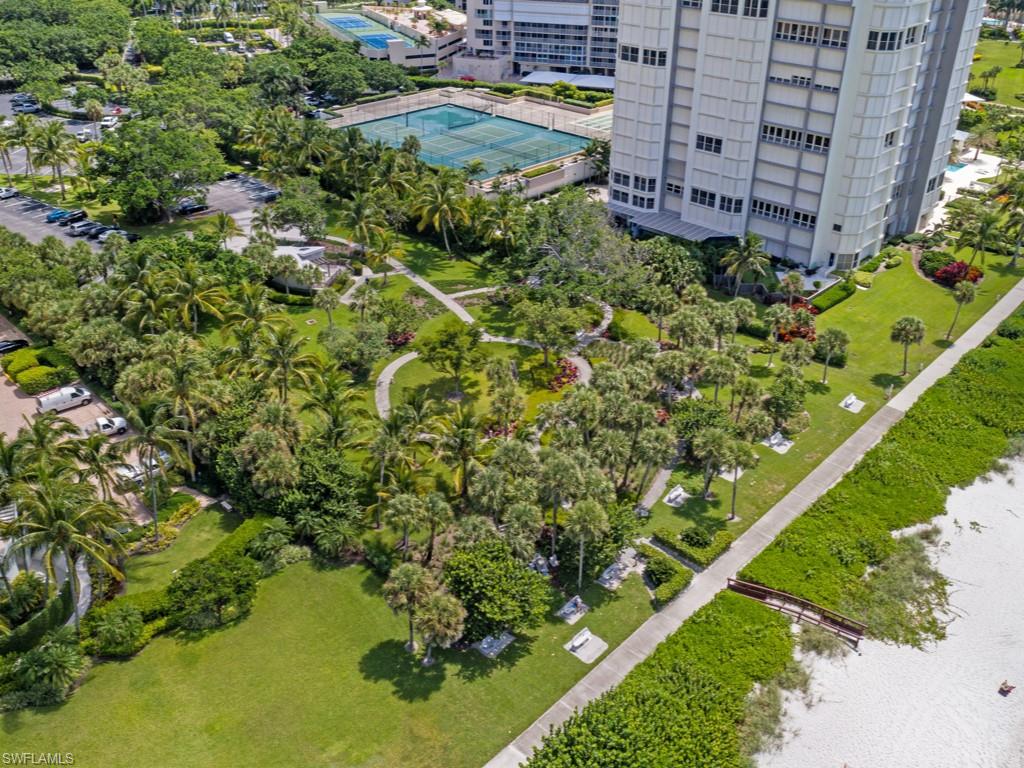 175 Colonade Circle Naples, FL 34103 - Photo 41 of 45 a view of a garden with a building