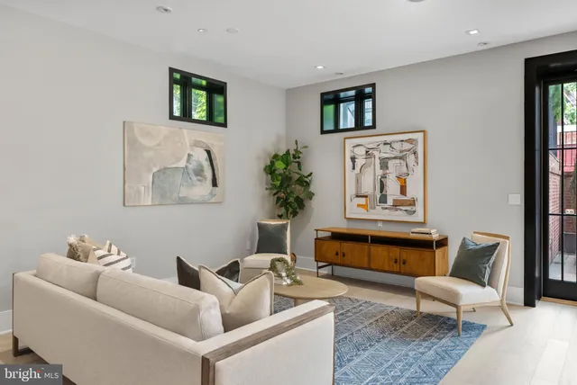 a living room with furniture and a couch