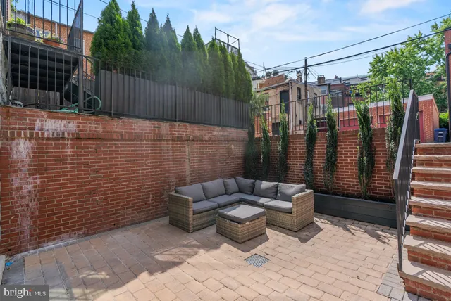 a view of yard with seating space