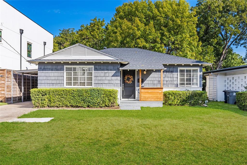4411 Merrell Road Dallas, TX 75229 - Photo 1 of 1 a front view of a house with a yard