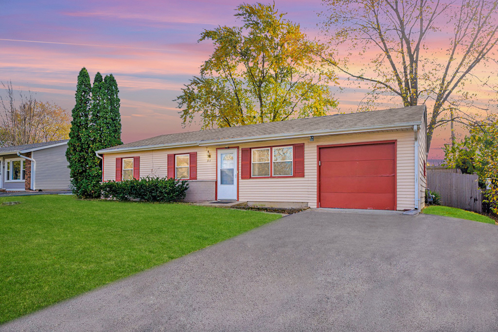 213 Rockhurst Road Bolingbrook, IL 60440 - Photo 2 of 14 a view of a house with a yard and potted plants