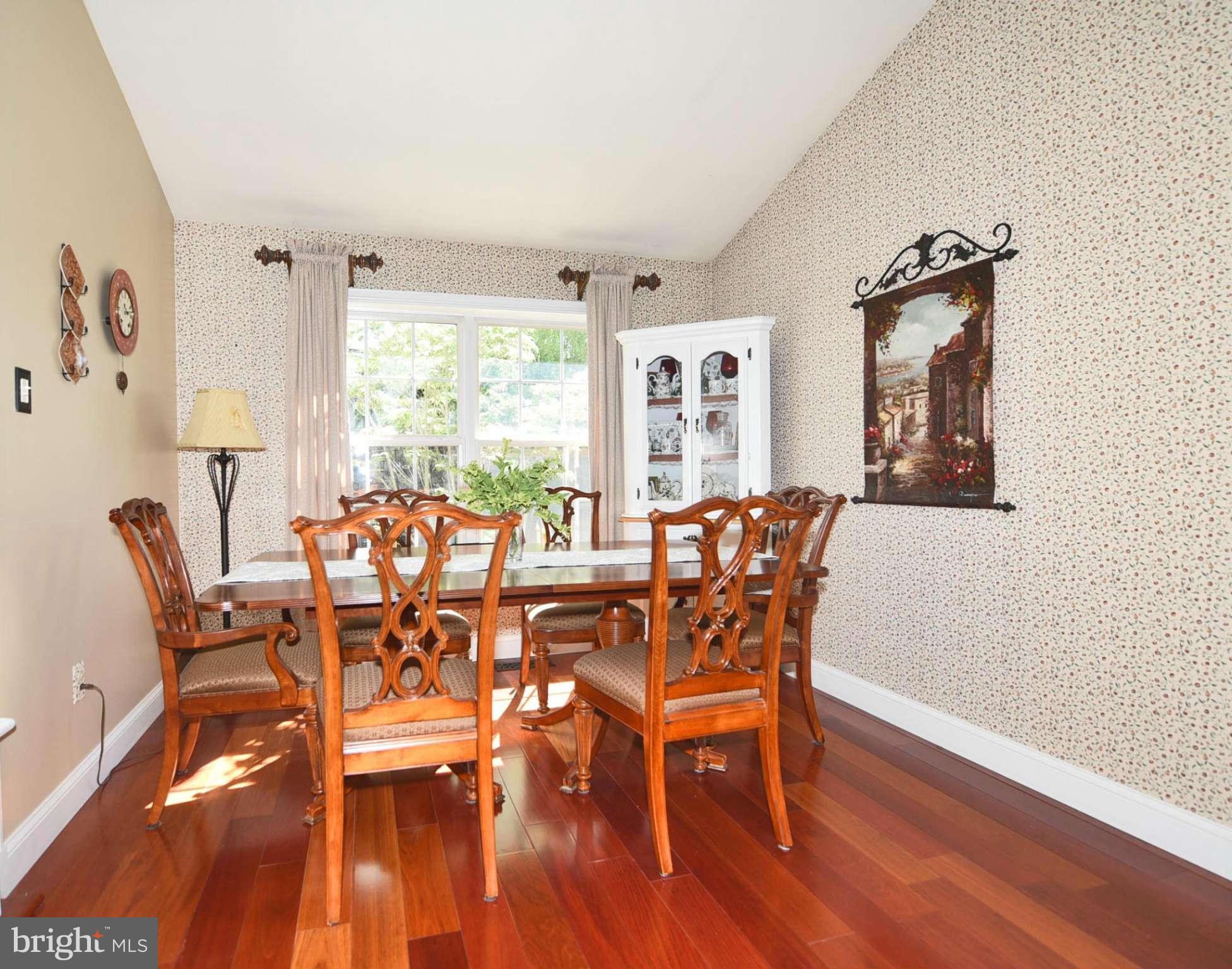 4505 King George Court Nottingham, MD 21236 - Photo 11 of 30 a dining room with furniture window wooden floor