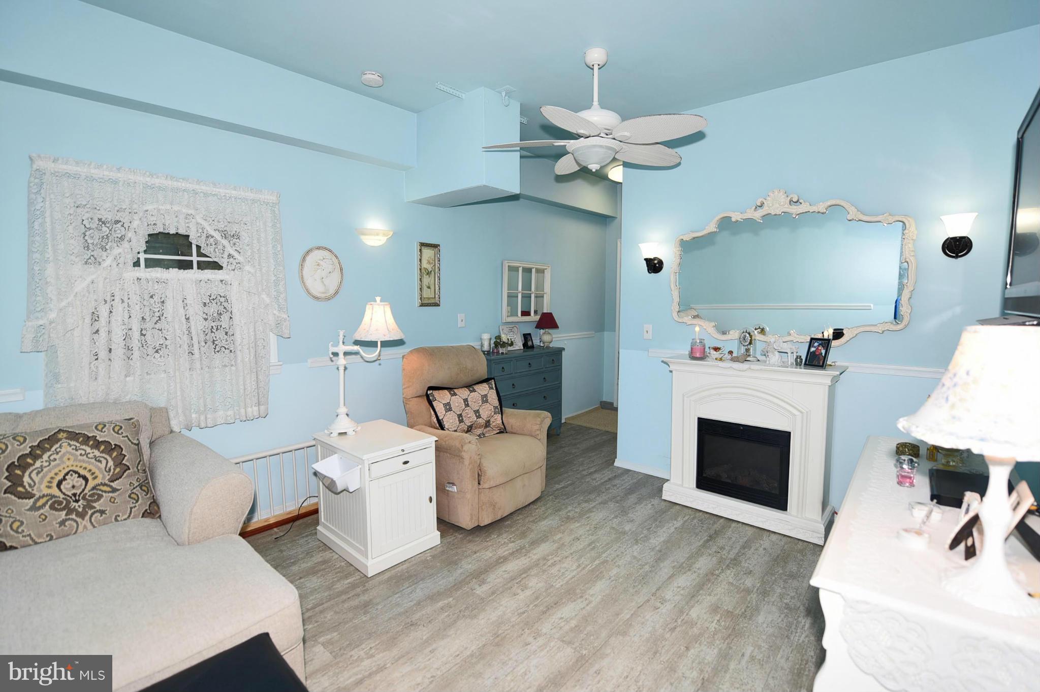 4505 King George Court Nottingham, MD 21236 - Photo 13 of 30 a living room with furniture and a fireplace