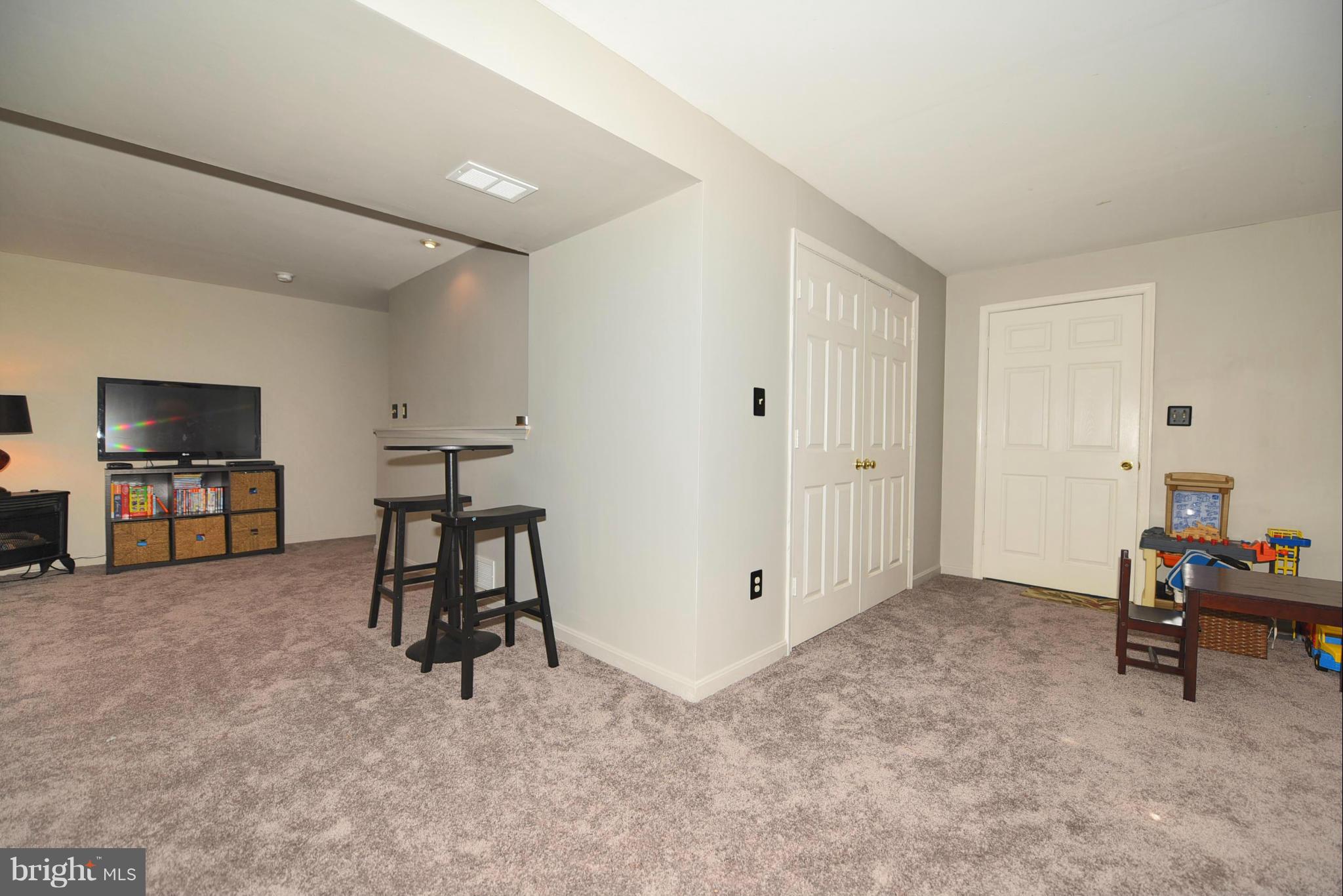 4505 King George Court Nottingham, MD 21236 - Photo 22 of 30 a view of a livingroom with furniture and a flat screen tv