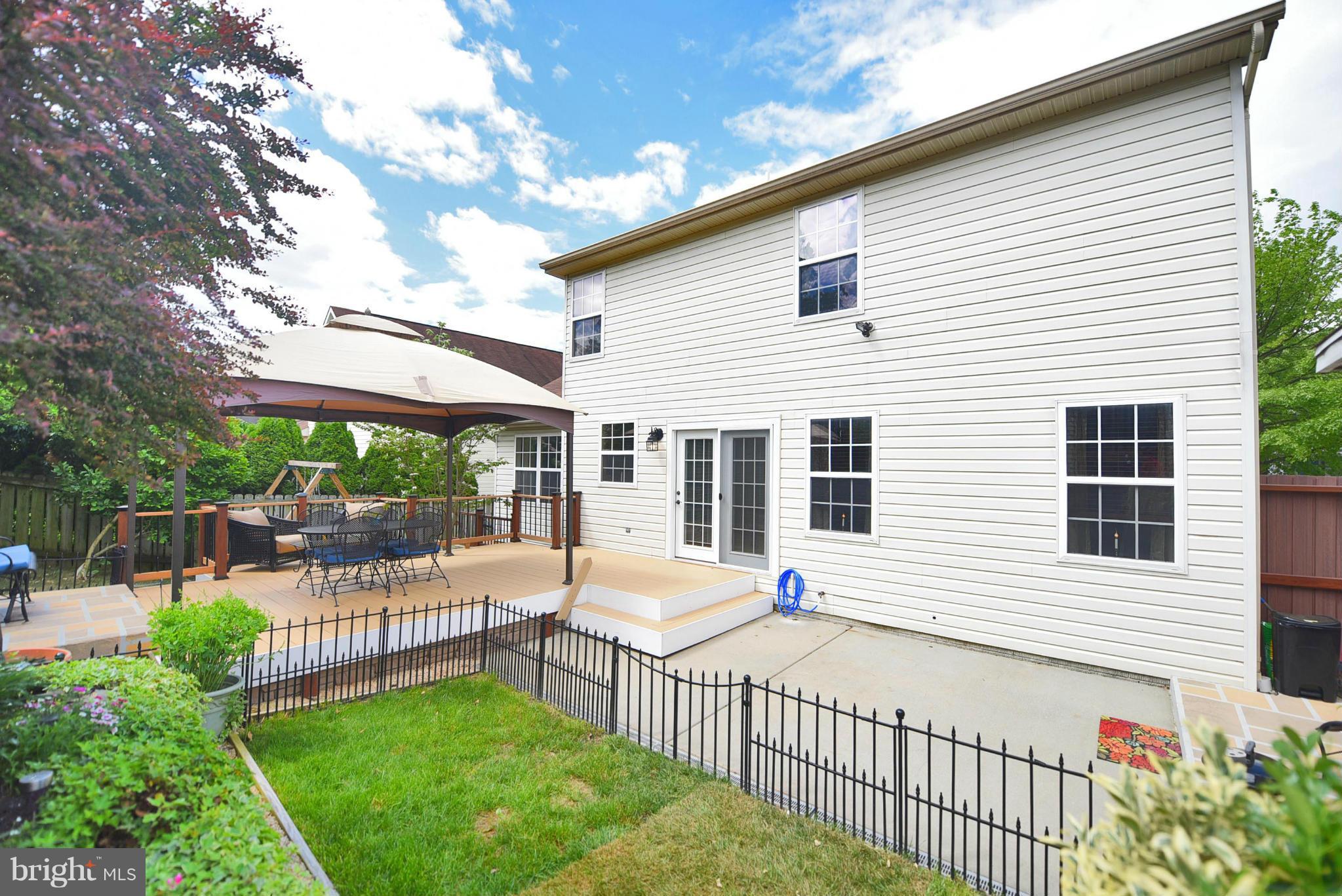 4505 King George Court Nottingham, MD 21236 - Photo 27 of 30 a front view of house with a garden and patio