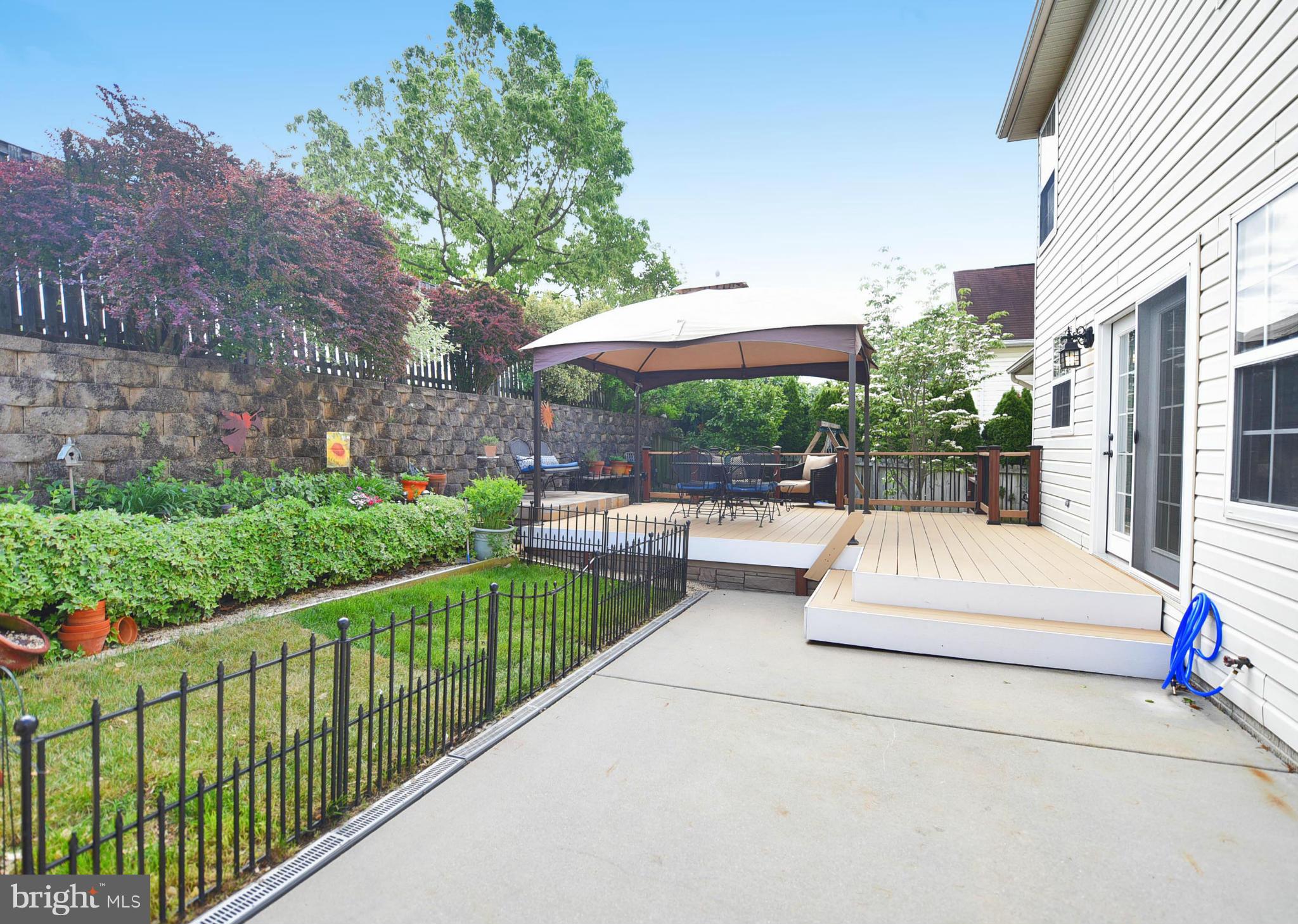 4505 King George Court Nottingham, MD 21236 - Photo 28 of 30 a view of house with backyard sitting area and garden