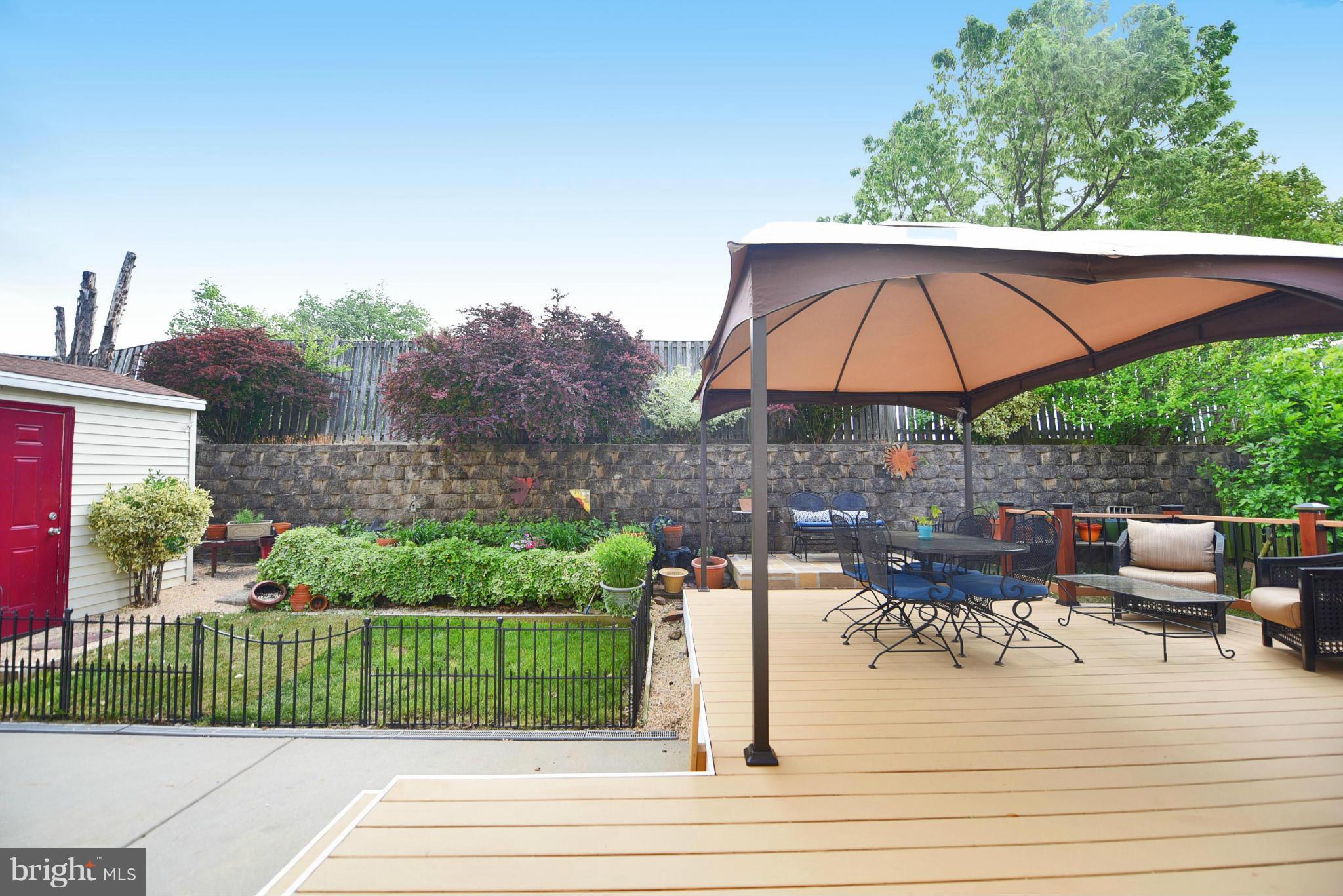 4505 King George Court Nottingham, MD 21236 - Photo 29 of 30 a view of backyard with seating space and wooden fence