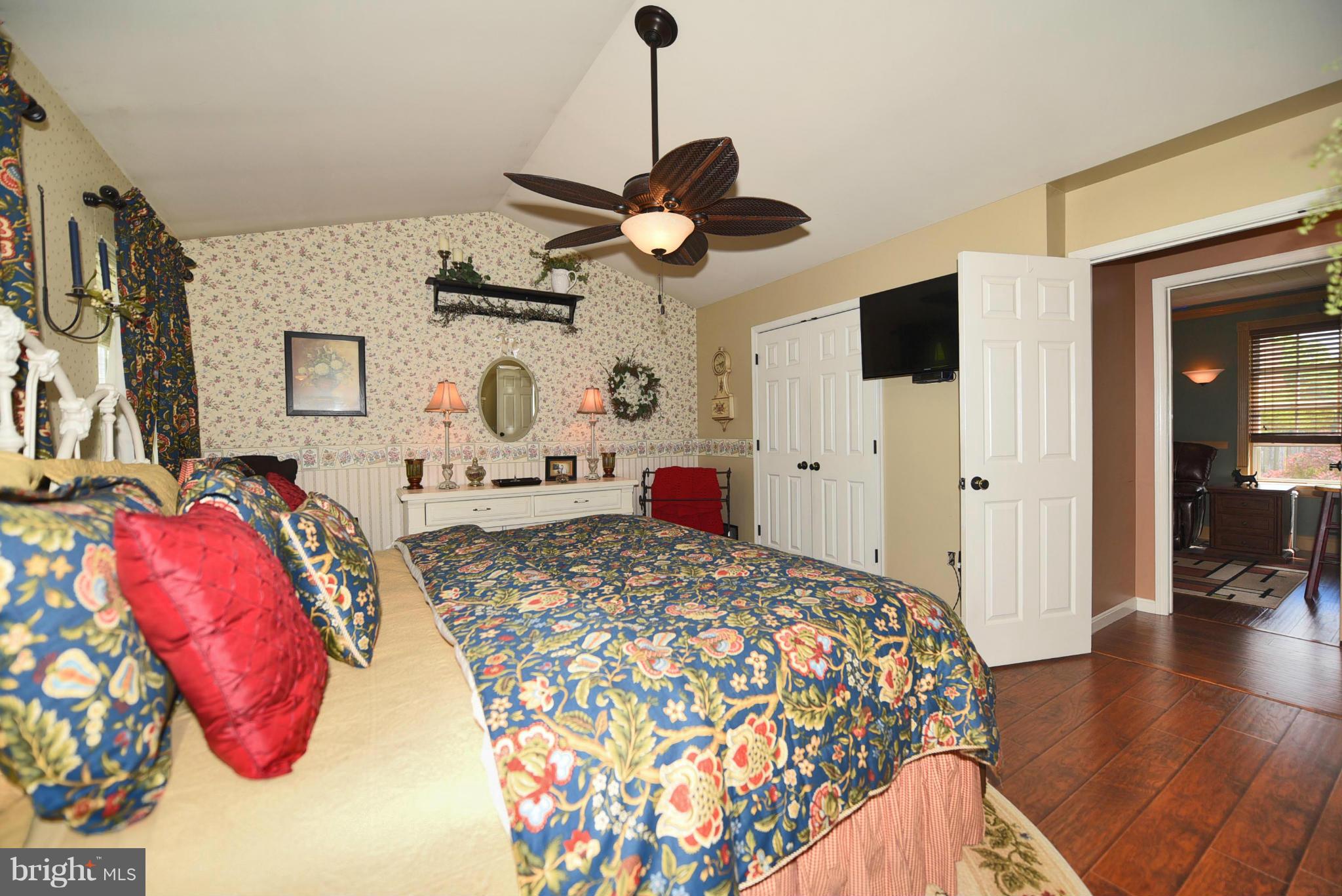 4505 King George Court Nottingham, MD 21236 - Photo 4 of 30 a bedroom with a bed and a chandelier