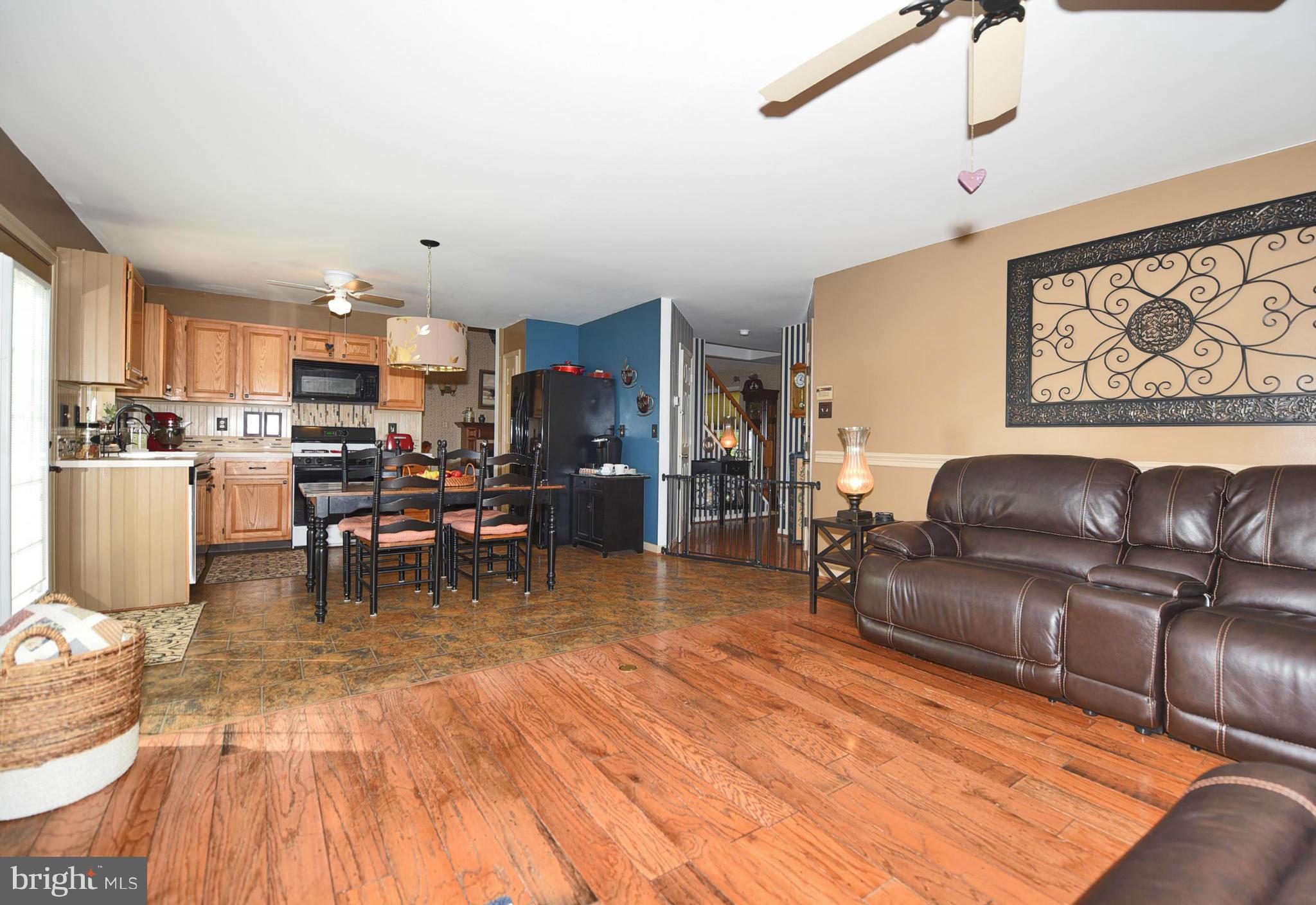 4505 King George Court Nottingham, MD 21236 - Photo 8 of 30 a living room with furniture and a wooden floor