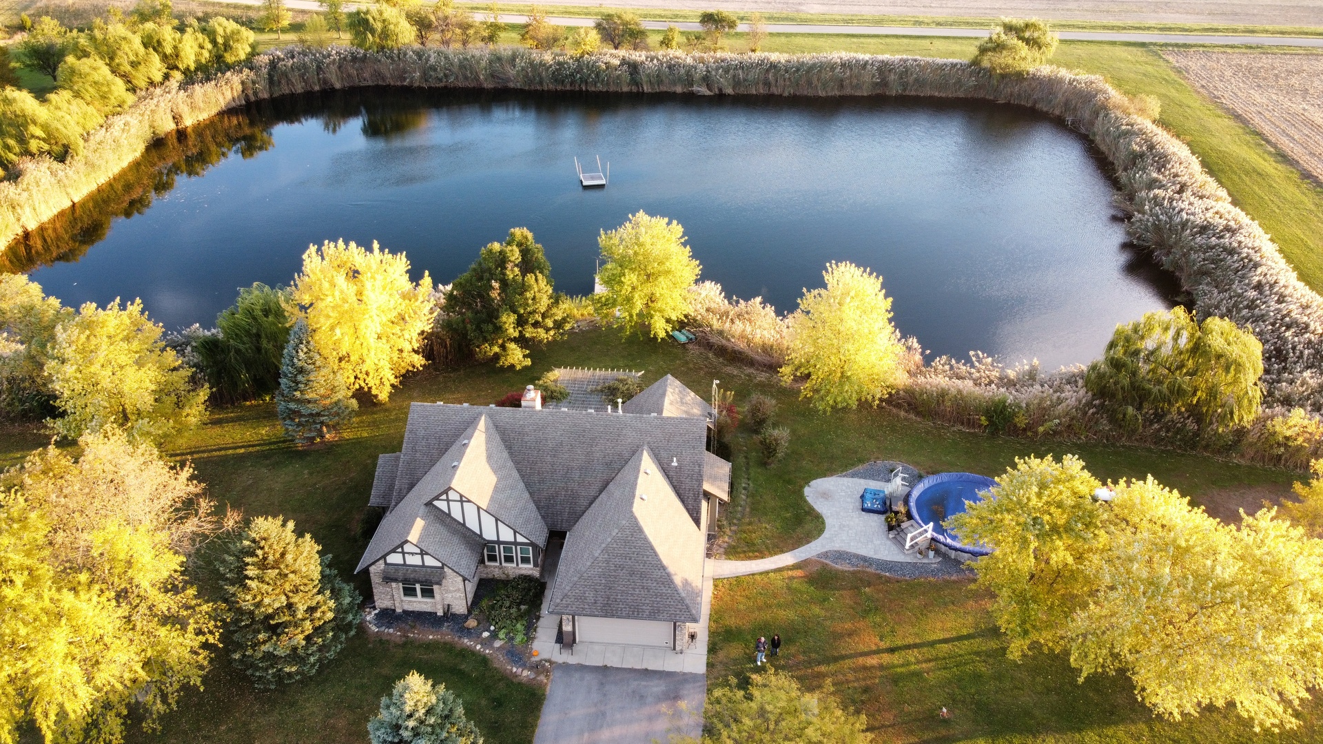 a view of a lake with a house in the background