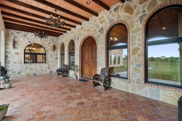 a bedroom with a bed and a fireplace
