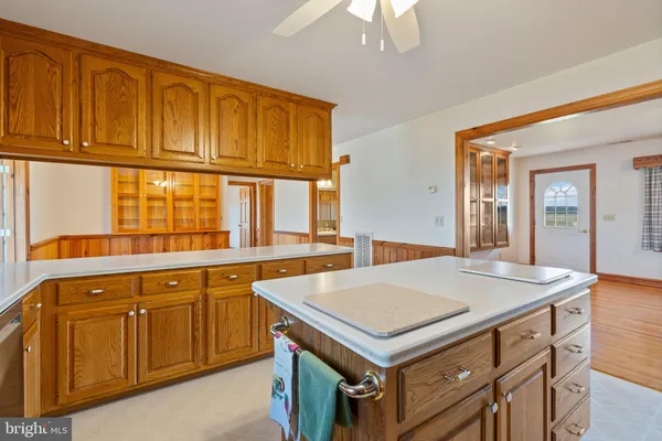a kitchen with stainless steel appliances granite countertop a sink and cabinets