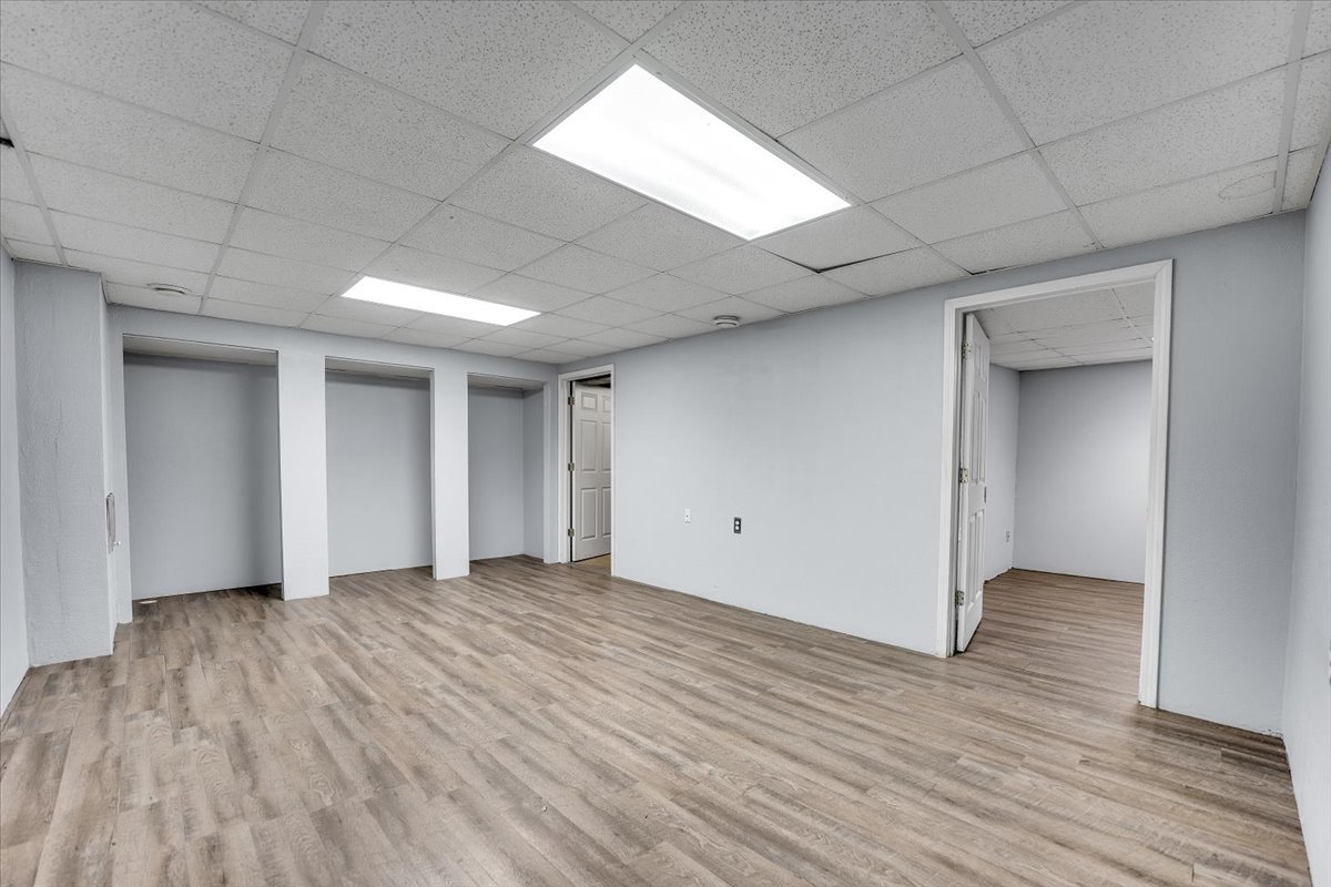 6621 Samantha Lane Rockford, IL 61107 - Photo 28 of 38 a view of an empty room with wooden floor and a window