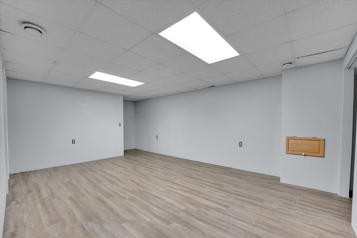 6621 Samantha Lane Rockford, IL 61107 - Photo 30 of 38 a view of room with wooden floor and white walls