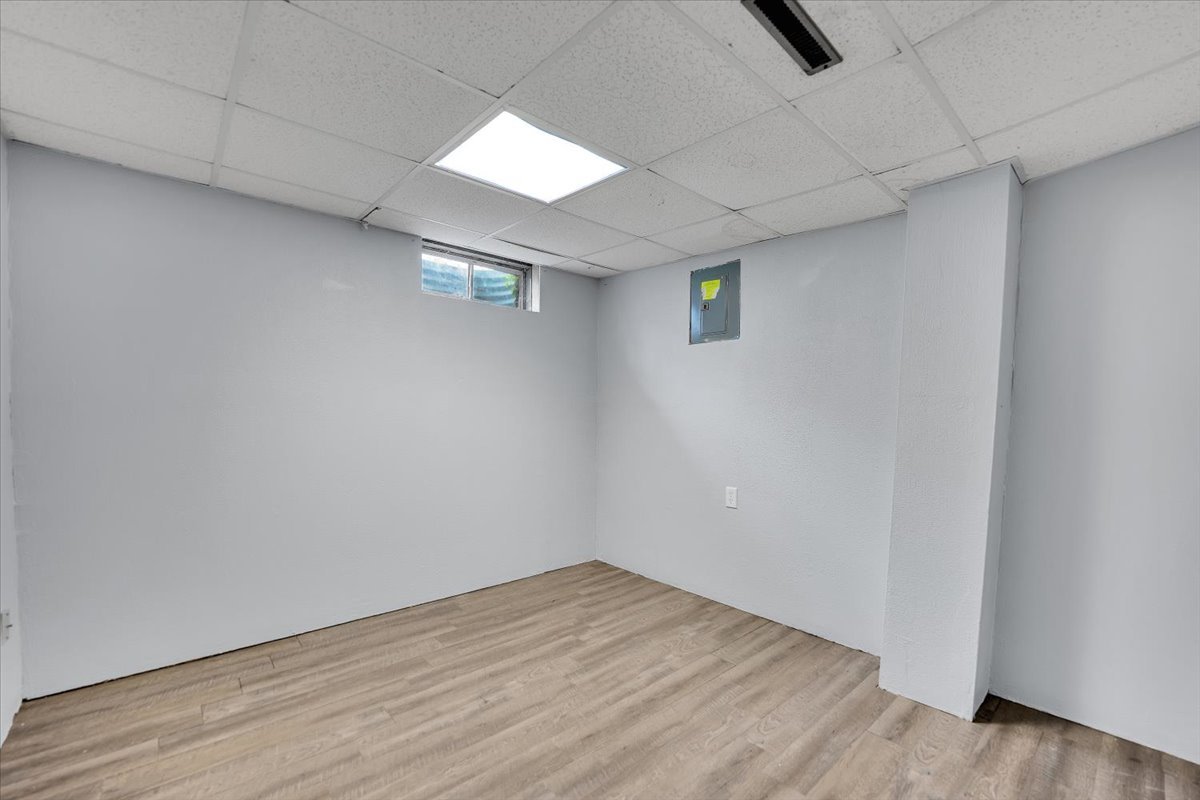 6621 Samantha Lane Rockford, IL 61107 - Photo 32 of 38 a view of empty room with wooden floor