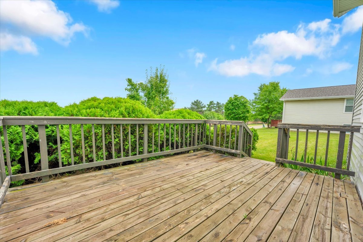 6621 Samantha Lane Rockford, IL 61107 - Photo 38 of 38 a view of a balcony with wooden floor