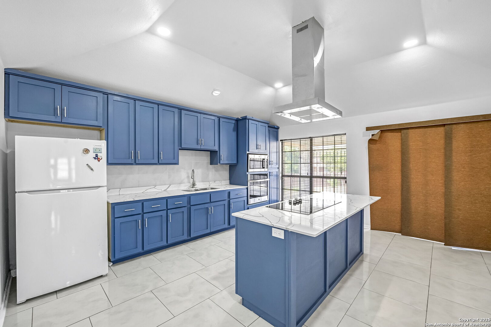 514 Jackson Keller Road San Antonio, TX 78216 - Photo 12 of 25 a kitchen with granite countertop a refrigerator a sink dishwasher a dining table and with furniture